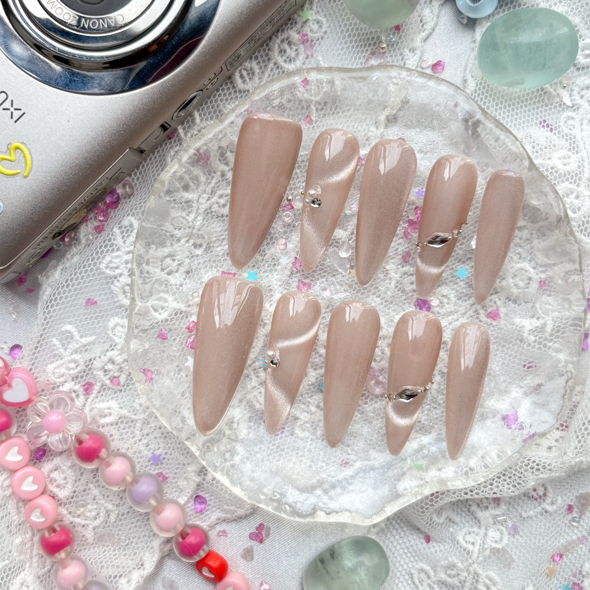 Custom Press-On Nails – Rose Gold Cat Eye with Pearls & Rhinestones in Long Stiletto Shape | Wynzy Pops Nails