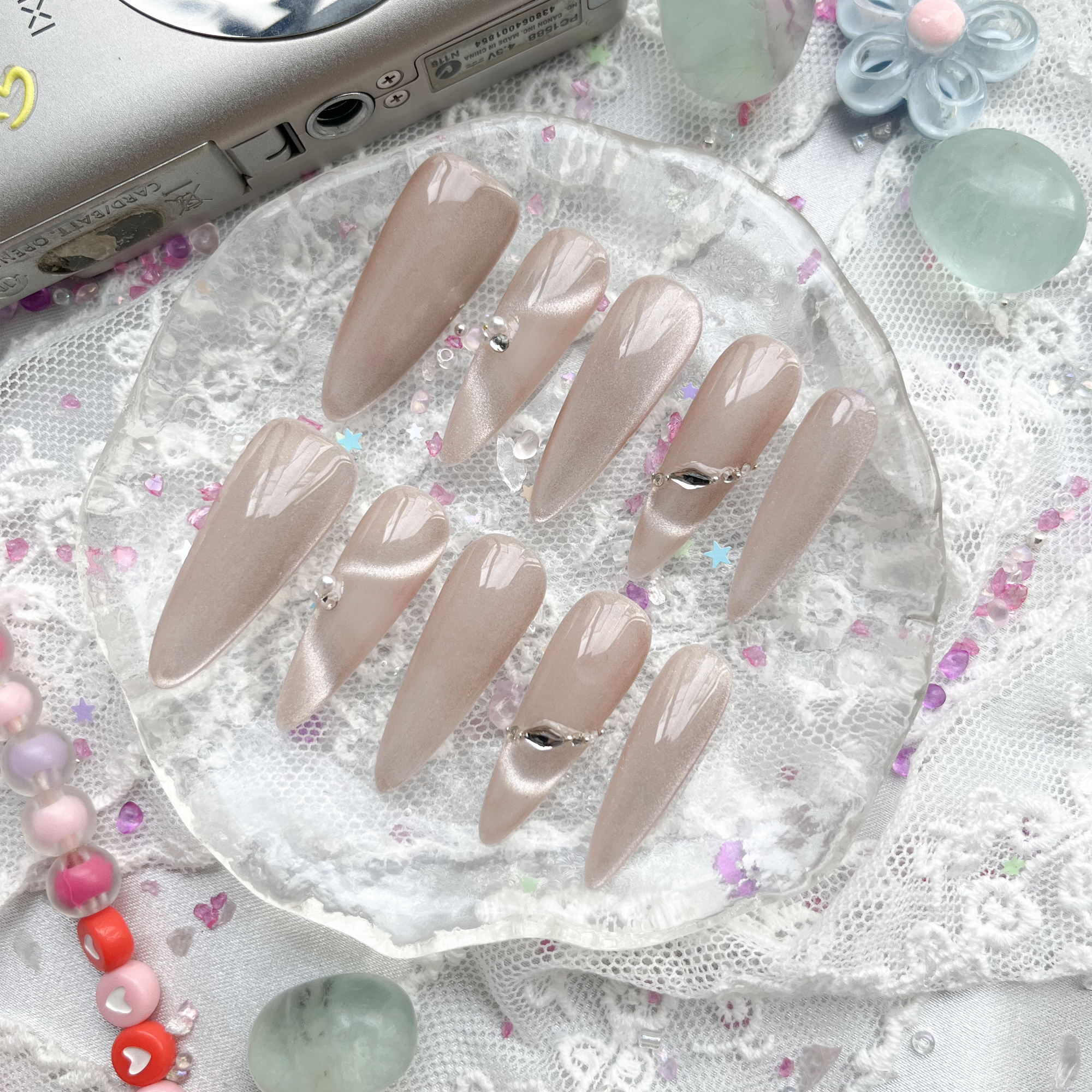 Custom Press-On Nails – Rose Gold Cat Eye with Pearls & Rhinestones in Long Stiletto Shape | Wynzy Pops Nails