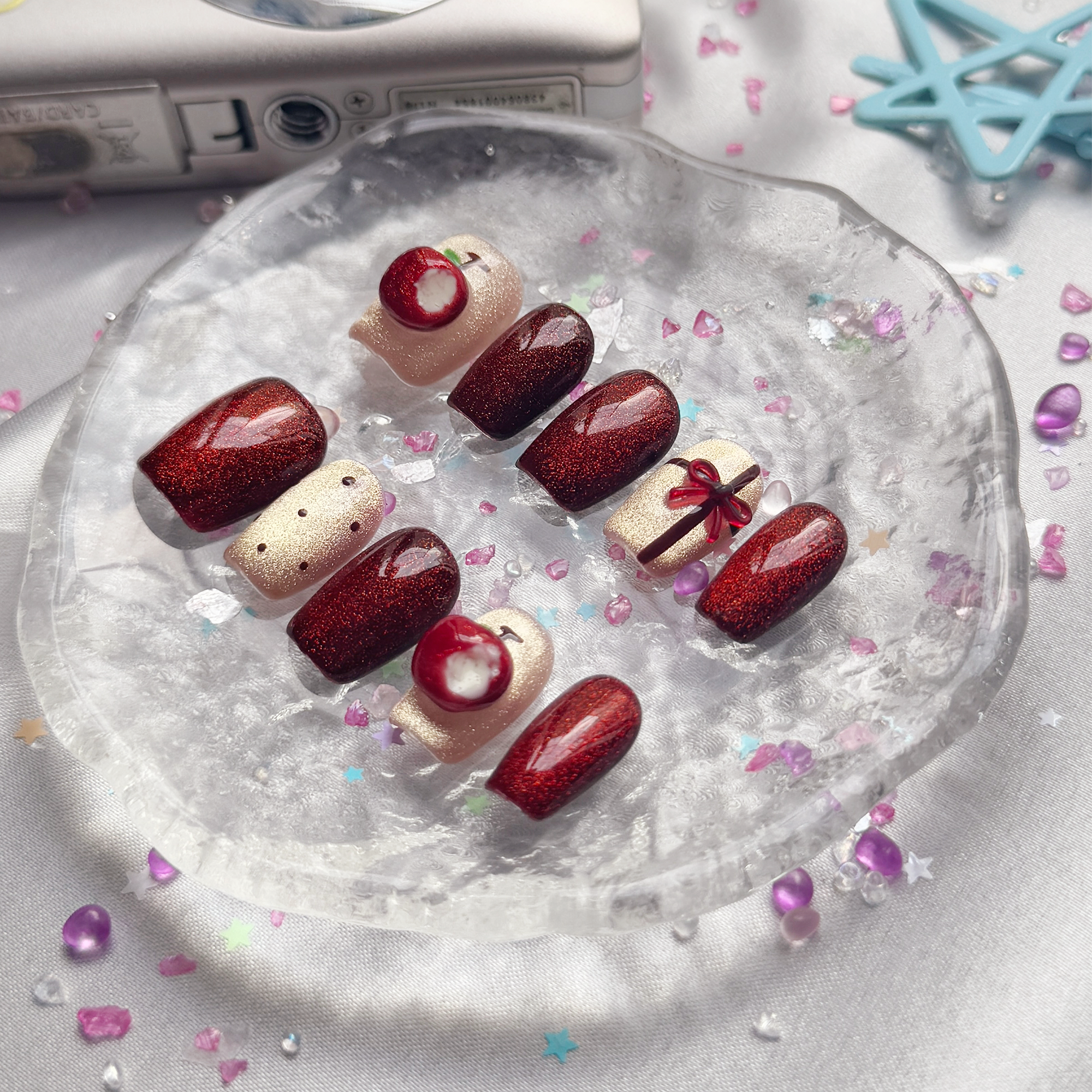 Custom Press-On Nails – Red Cat Eye with Apple & Bow Accents | Wynzy Pops Nails