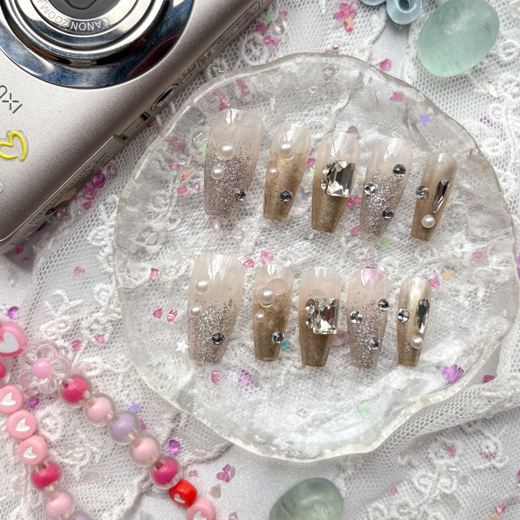 Press-On Nails – Gold Glitter with Pearls & Rhinestones | Elegant Clear Tip Coffin Set | Wynzy Pops Nails
