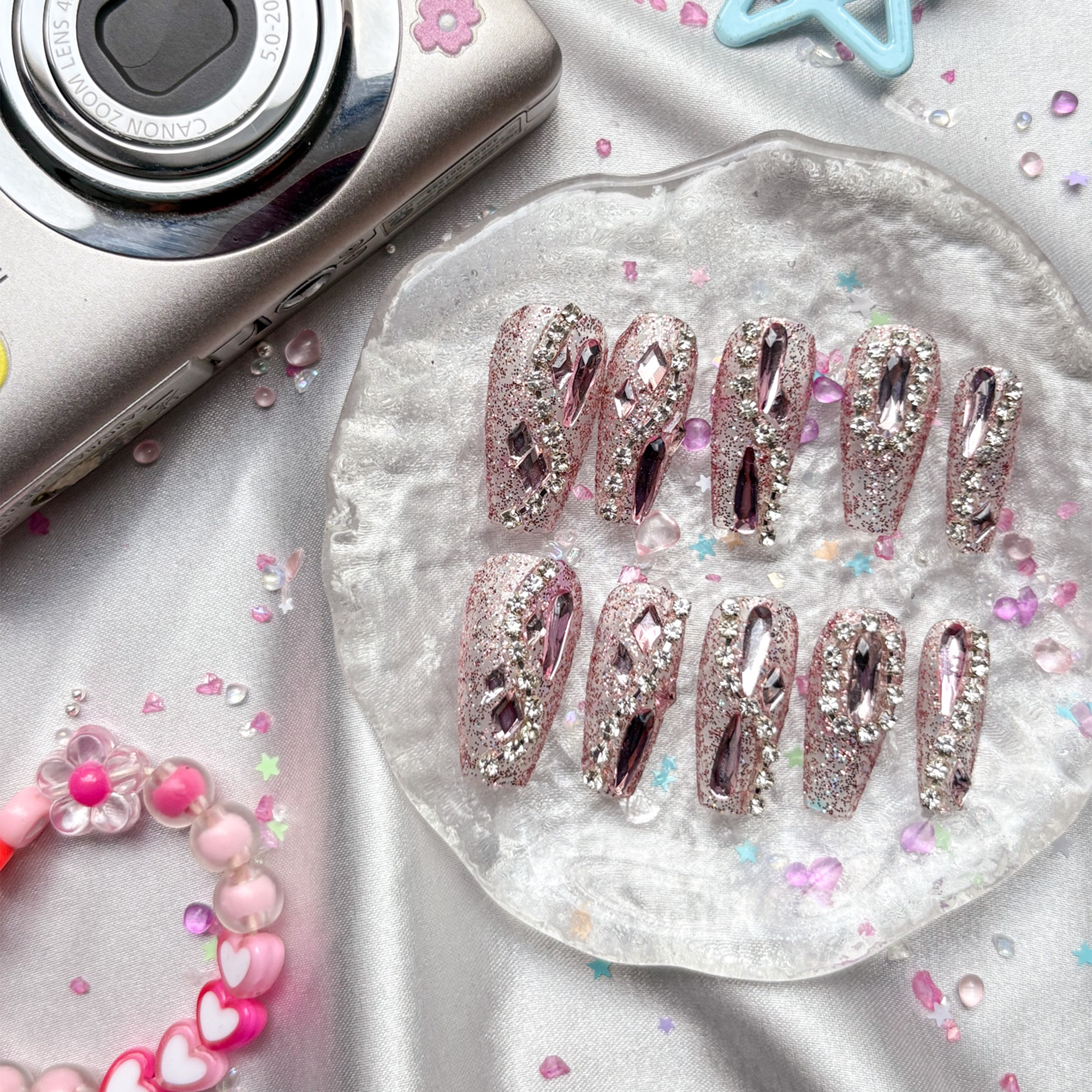 Press-On Nails – Long Coffin Pink Glitter with Silver Rhinestone Outline & Large Gem Accents | Wynzy Pops Nails