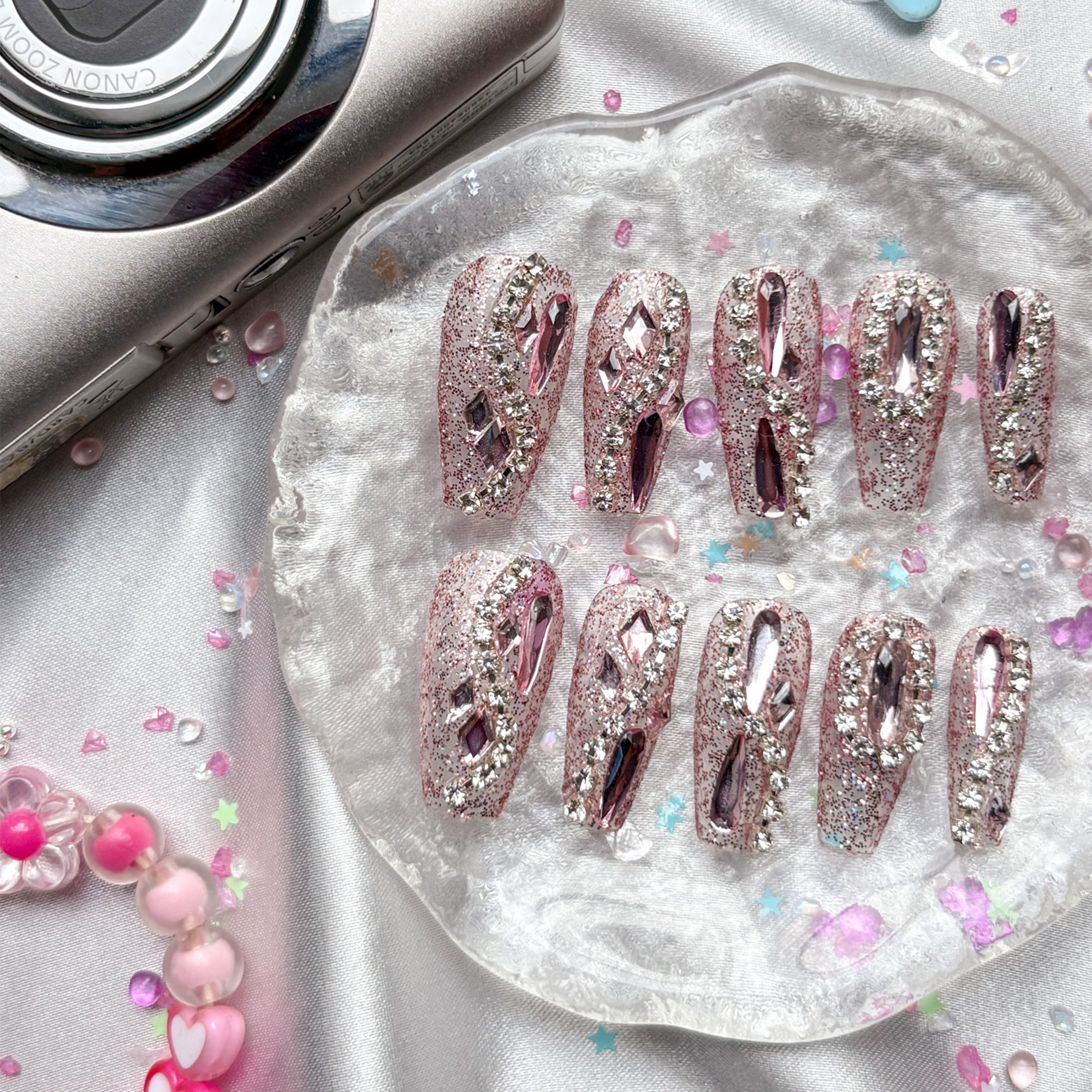 Press-On Nails – Long Coffin Pink Glitter with Silver Rhinestone Outline & Large Gem Accents | Wynzy Pops Nails