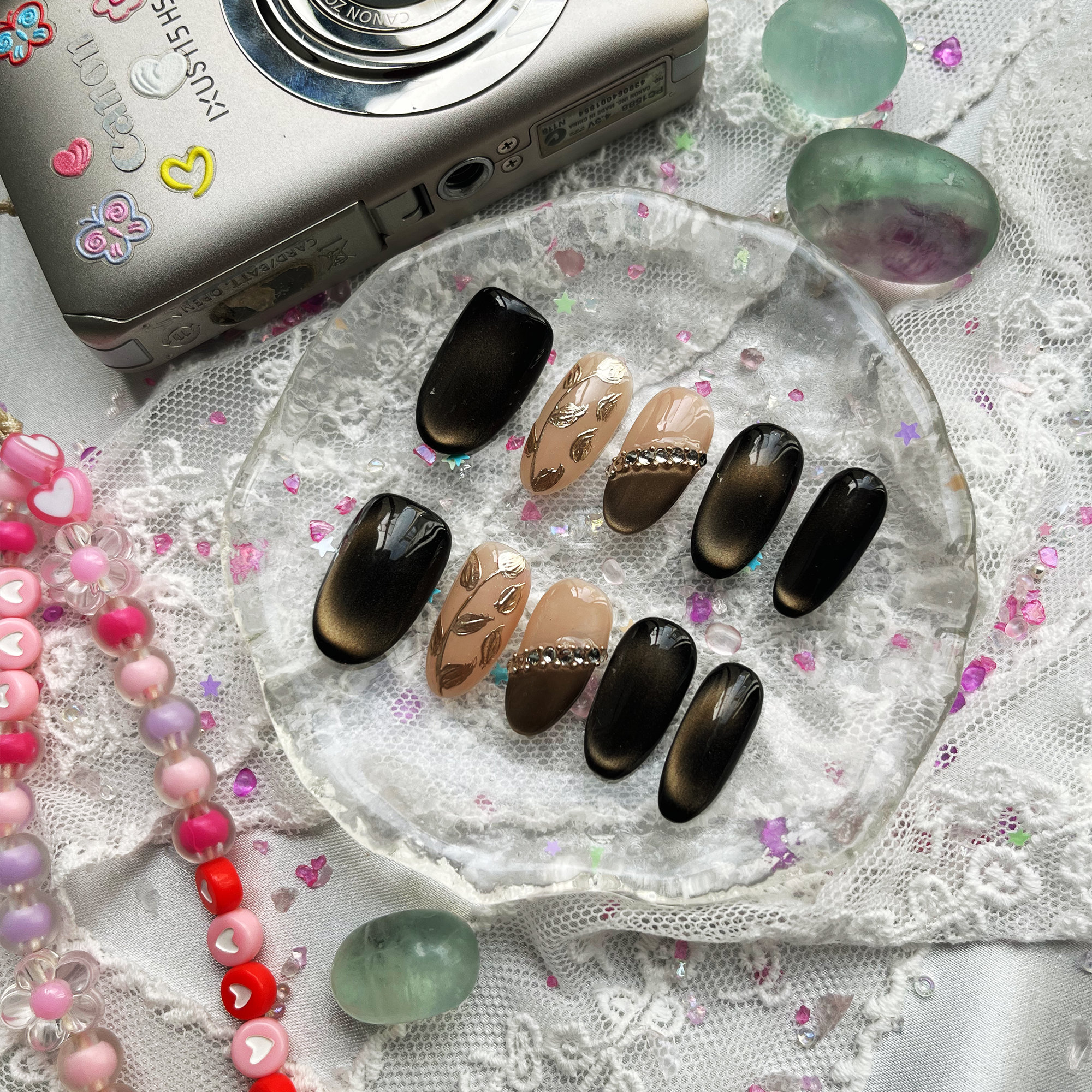 Custom Press-On Nails – Black Cat-Eye & Nude with Gold Leaf & Rhinestones | Fall-Inspired Almond Nails | Wynzy Pops Nails